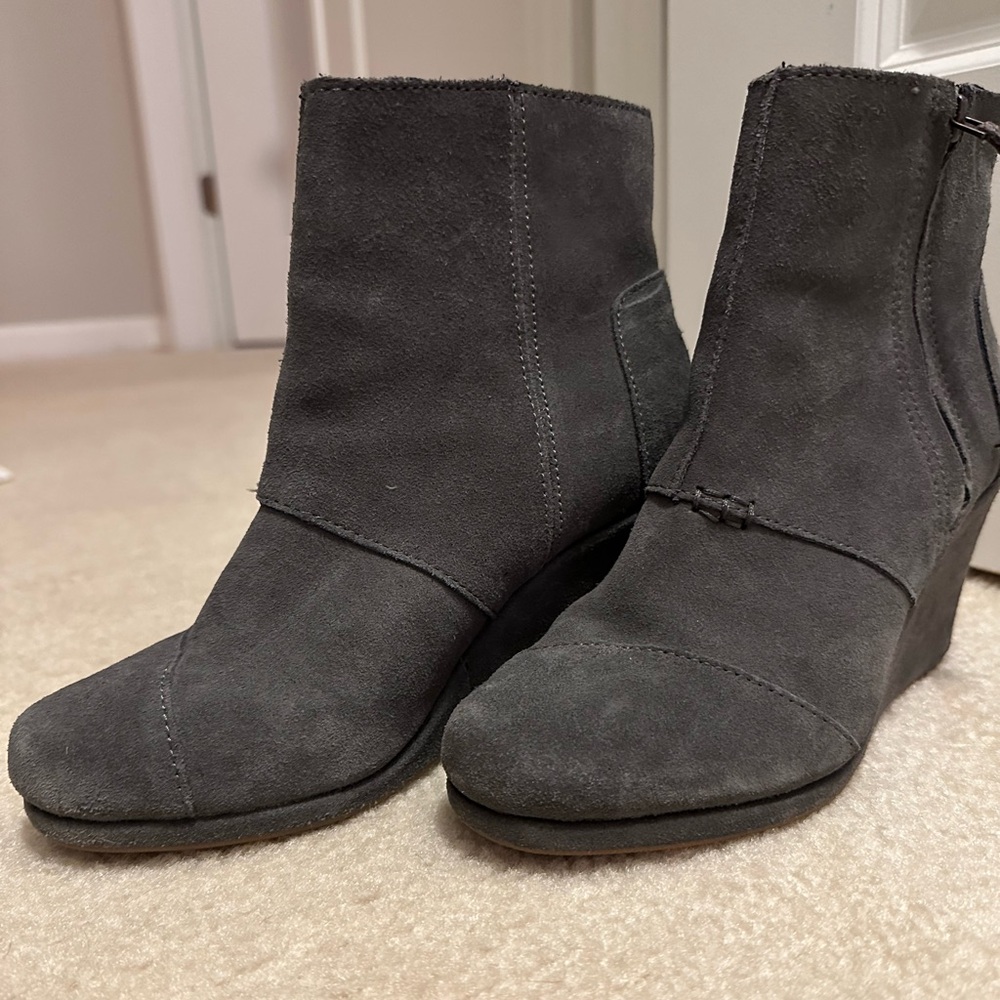 Tom’s gray suede wedge boots.